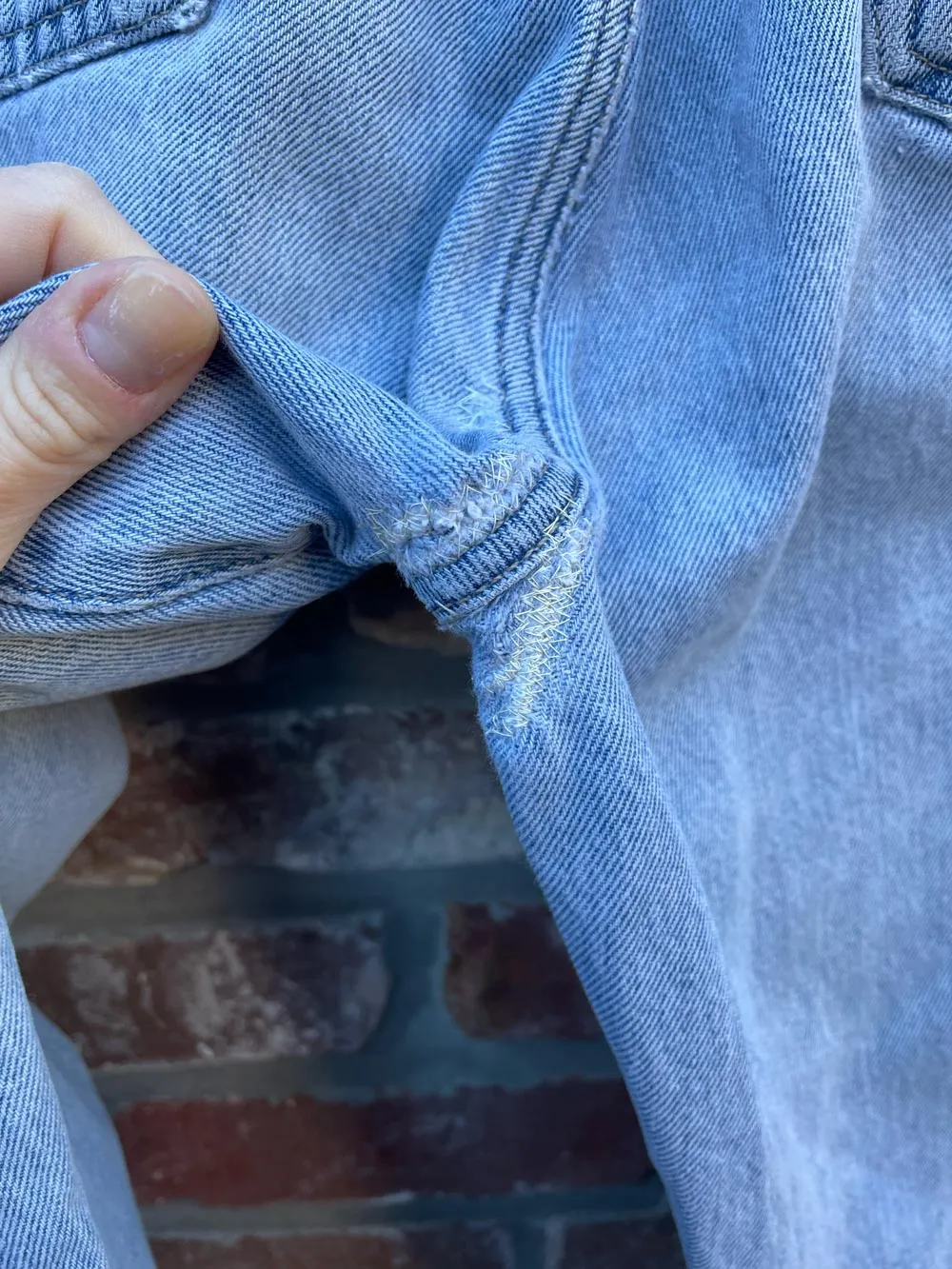 vintage 90s guess light wash jeans sold by Good Market Thrift Store product image thumbnail 4