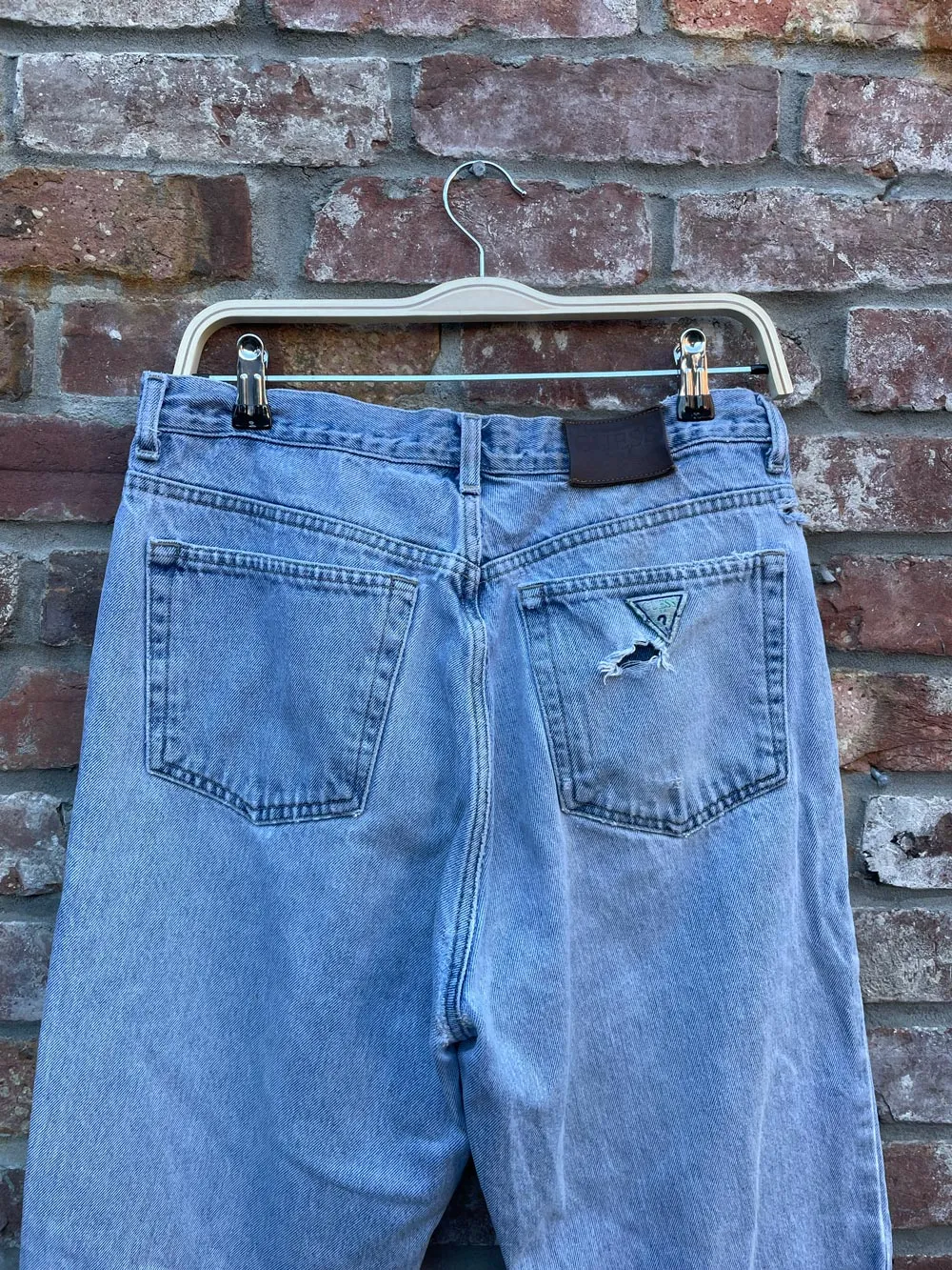 vintage 90s guess light wash jeans sold by Good Market Thrift Store