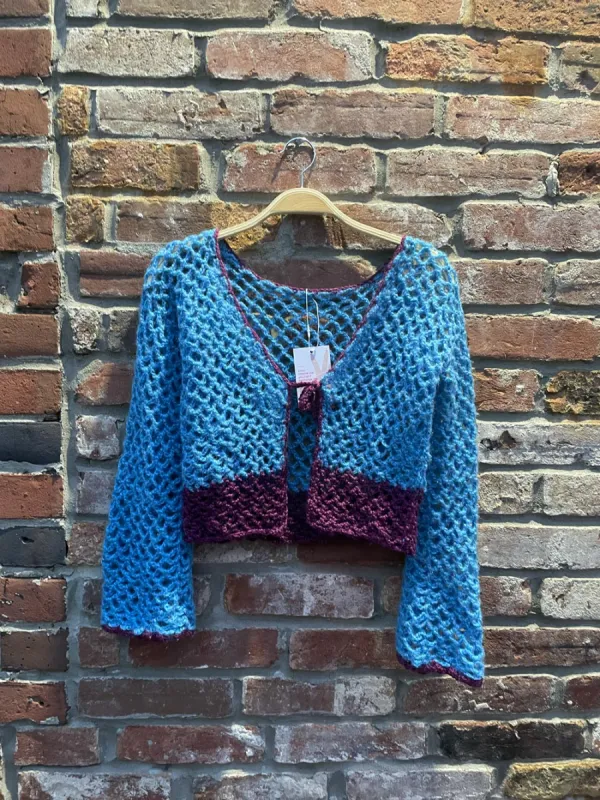 hand-made crochet crop cardigan top sold by Good Market Thrift Store