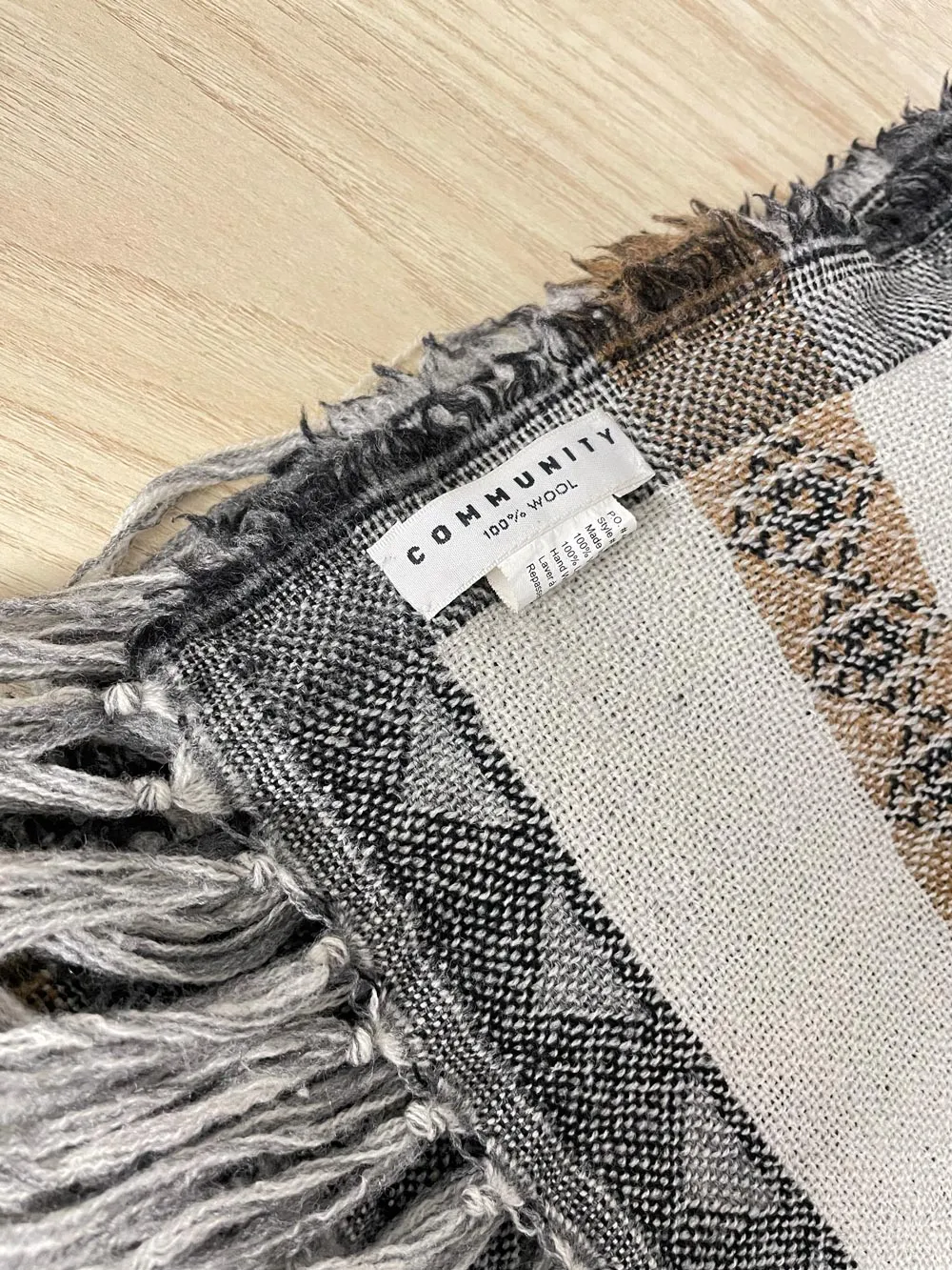 community 100% wool blanket scarf sold by Good Market Thrift Store