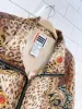 vintage evr chain animal print silk bomber jacket sold by Good Market Thrift Store