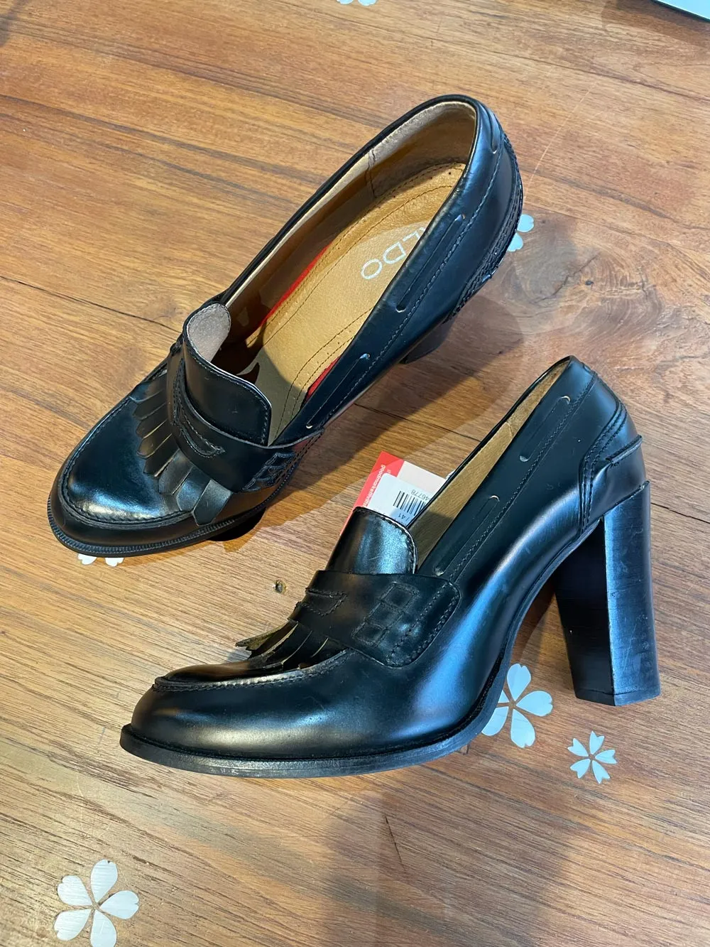 aldo fringe leather heeled penny loafer sold by Good Market Thrift Store
