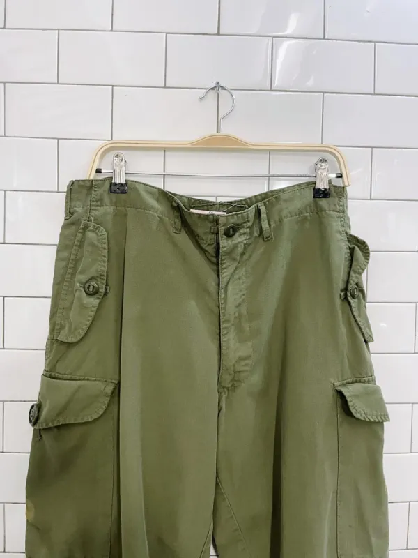 vintage army surplus cargo pants sold by Good Market Thrift Store