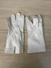 vintage white butter leather gloves sold by Good Market Thrift Store
