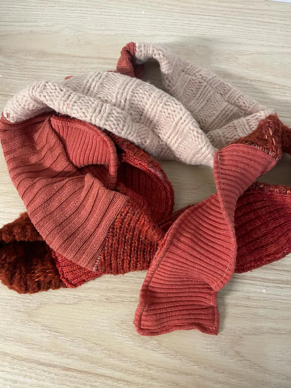 handmade 'free people vibes' long knit skinny scarf sold by Good Market Thrift Store