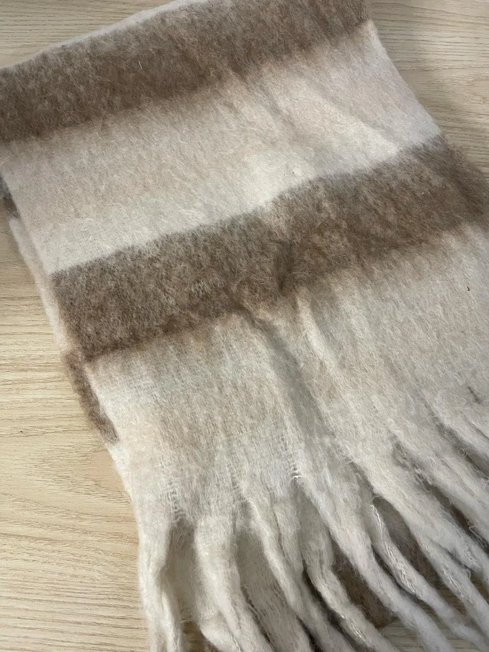 neutral blanket stripe super soft scarf sold by Good Market Thrift Store