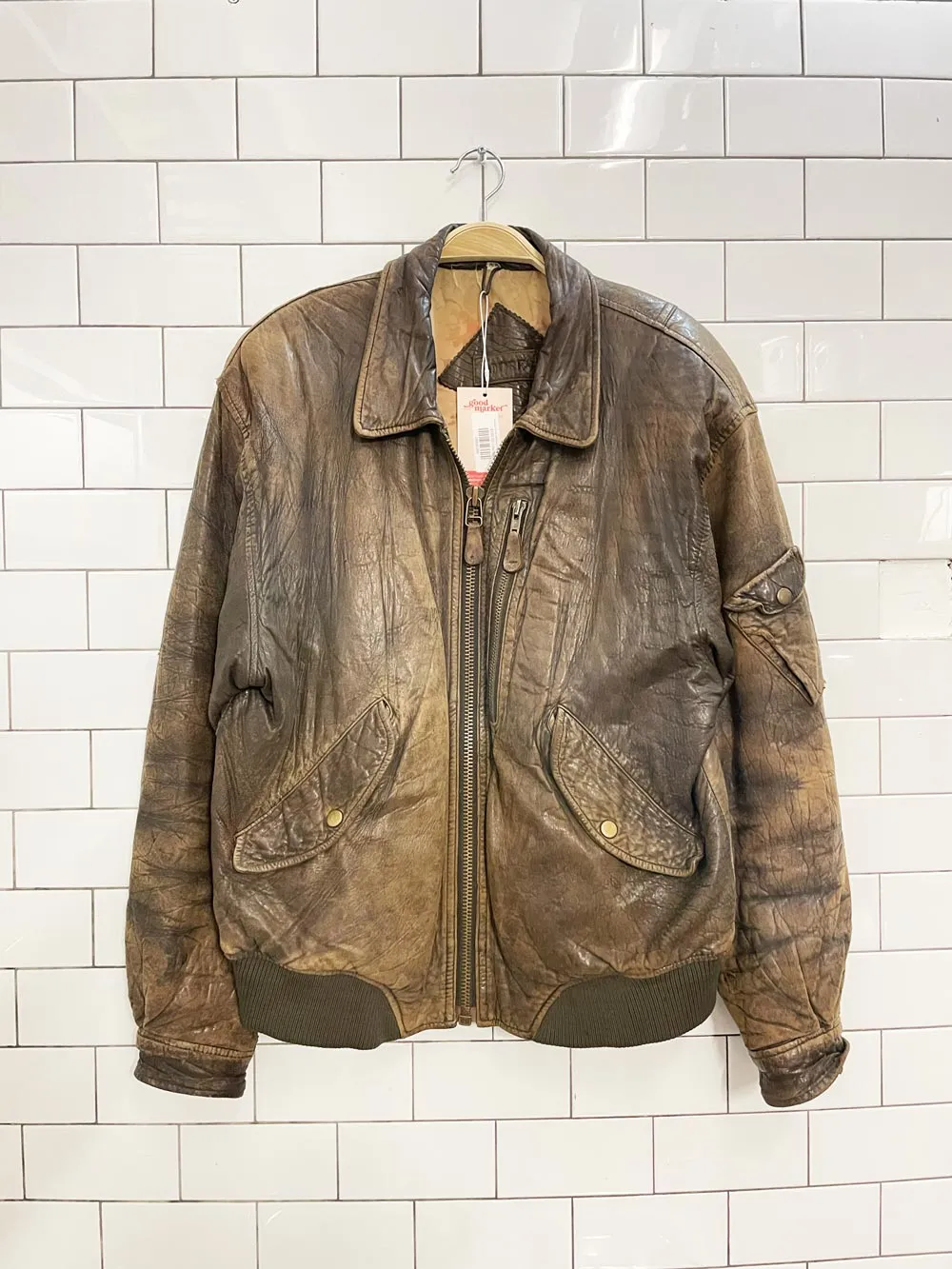 vintage moores distressed leather bomber jacket sold by Good Market Thrift Store