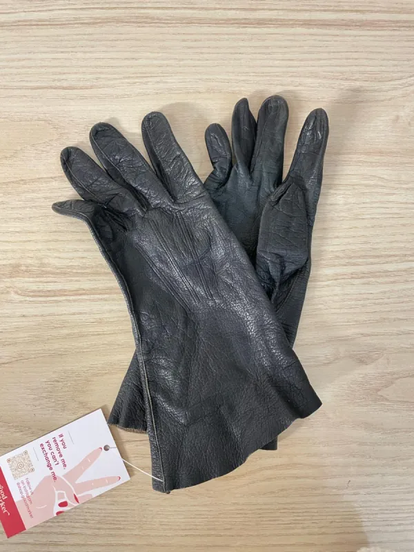 black unlined leather gloves sold by Good Market Thrift Store