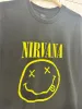 nirvana smiley double sided graphic tee sold by Good Market Thrift Store