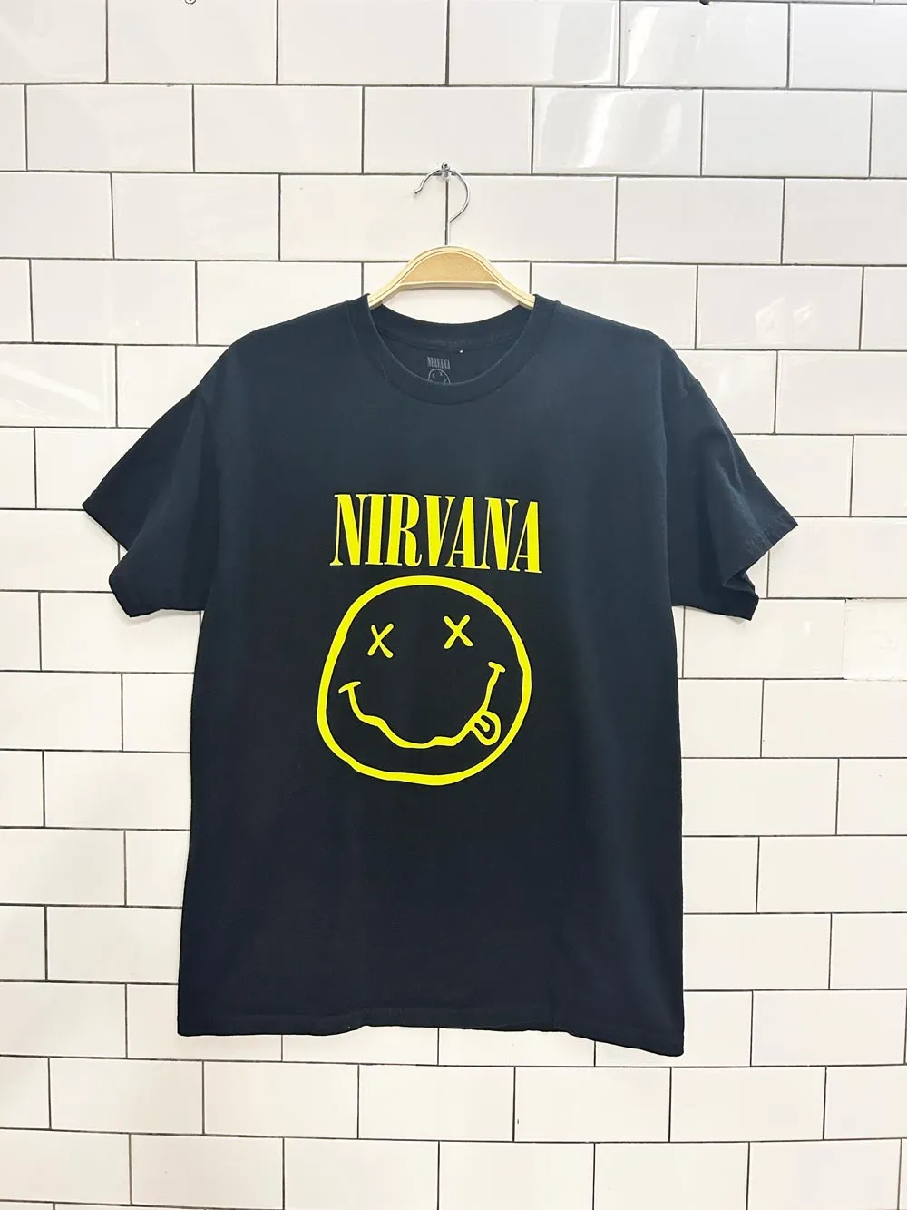 nirvana smiley double sided graphic tee sold by Good Market Thrift Store