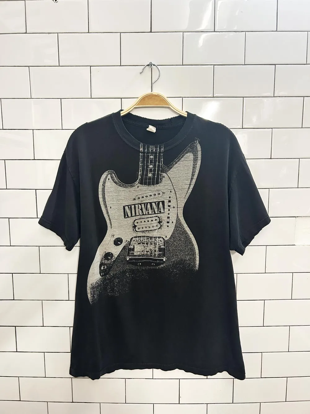 vintage 00s nirvana grunge guitar graphic tee sold by Good Market Thrift Store