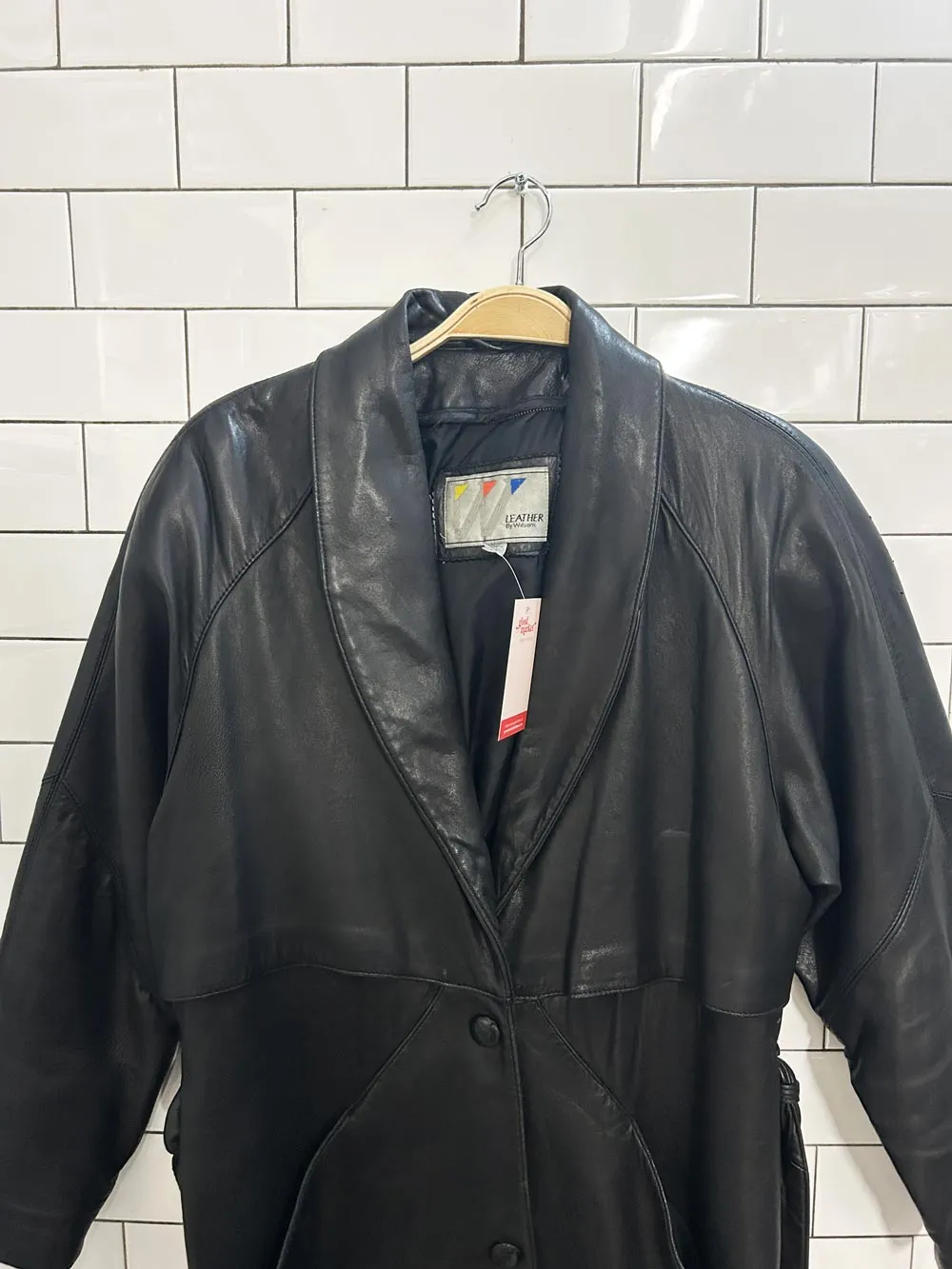 vintage 90s wilsons leather trench coat sold by Good Market Thrift Store