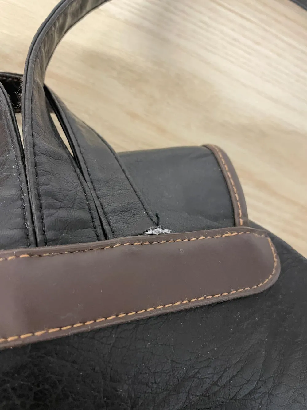 vintage 90s mouflon faux leather backpack sold by Good Market Thrift Store product image thumbnail 4