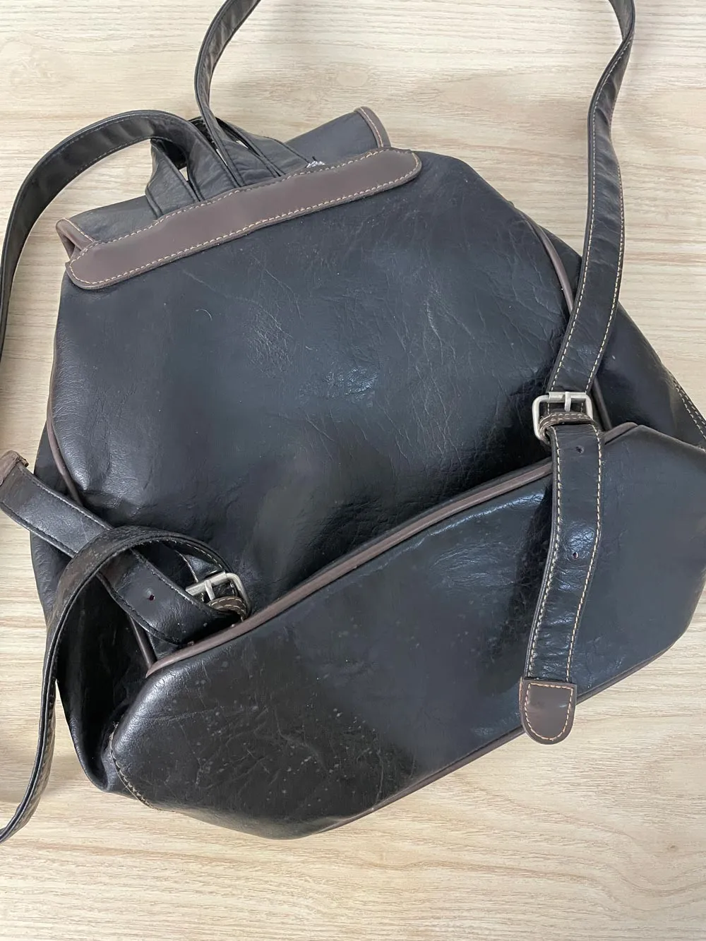 vintage 90s mouflon faux leather backpack sold by Good Market Thrift Store product image thumbnail 3