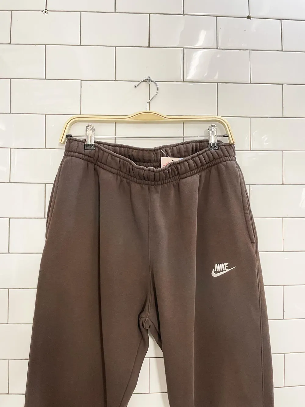 nike small check logo fleece sweatpant sold by Good Market Thrift Store