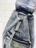 vintage 80s liz thomas acid wash denim backpack sold by Good Market Thrift Store