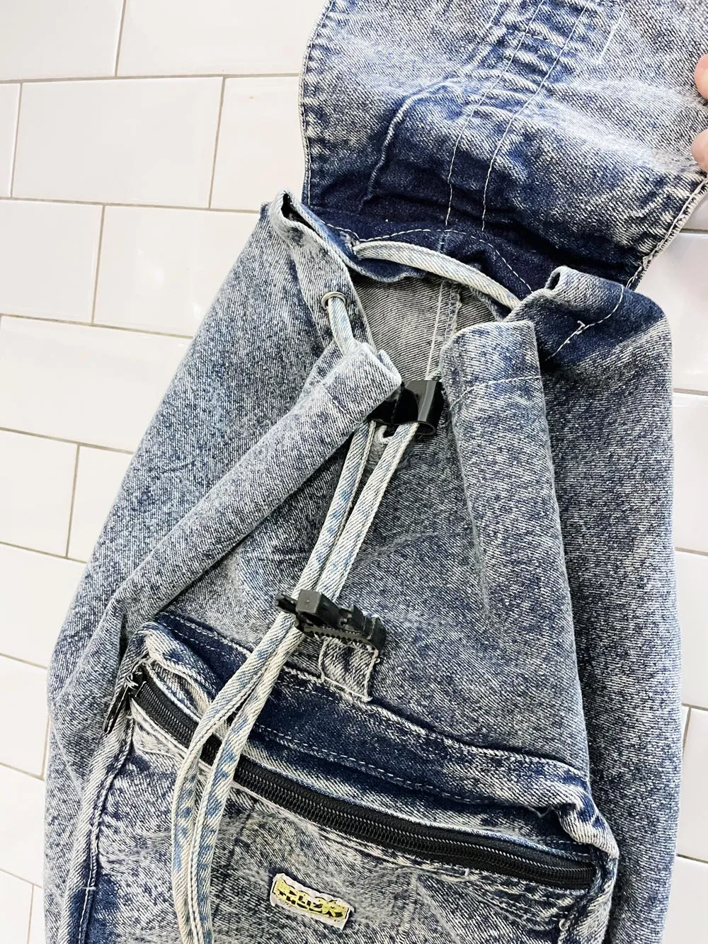 vintage 80s liz thomas acid wash denim backpack sold by Good Market Thrift Store product image thumbnail 4