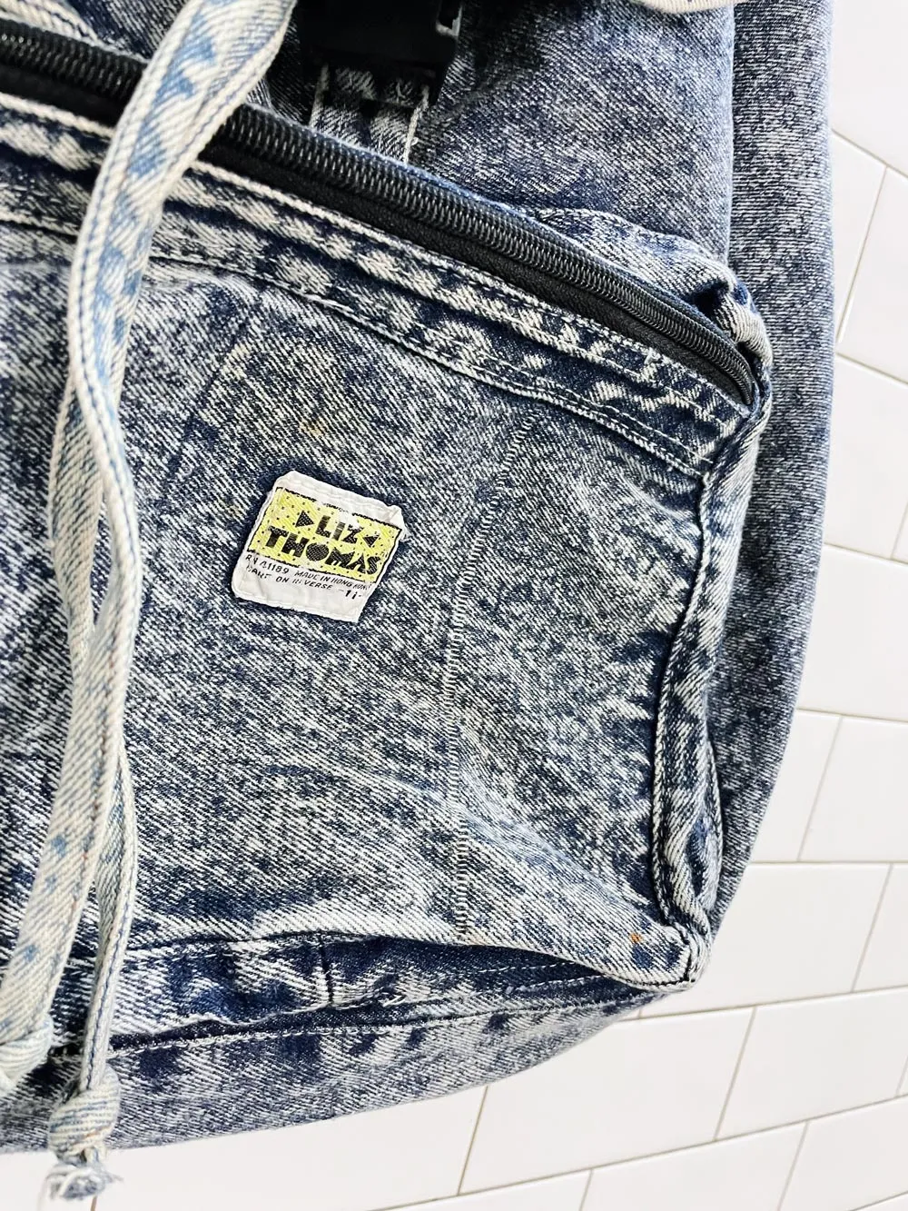 vintage 80s liz thomas acid wash denim backpack sold by Good Market Thrift Store product image thumbnail 3