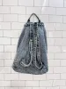 vintage 80s liz thomas acid wash denim backpack sold by Good Market Thrift Store