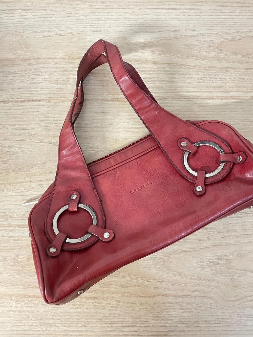y2k graffity paris soft leather shoulder bag sold by Good Market Thrift Store