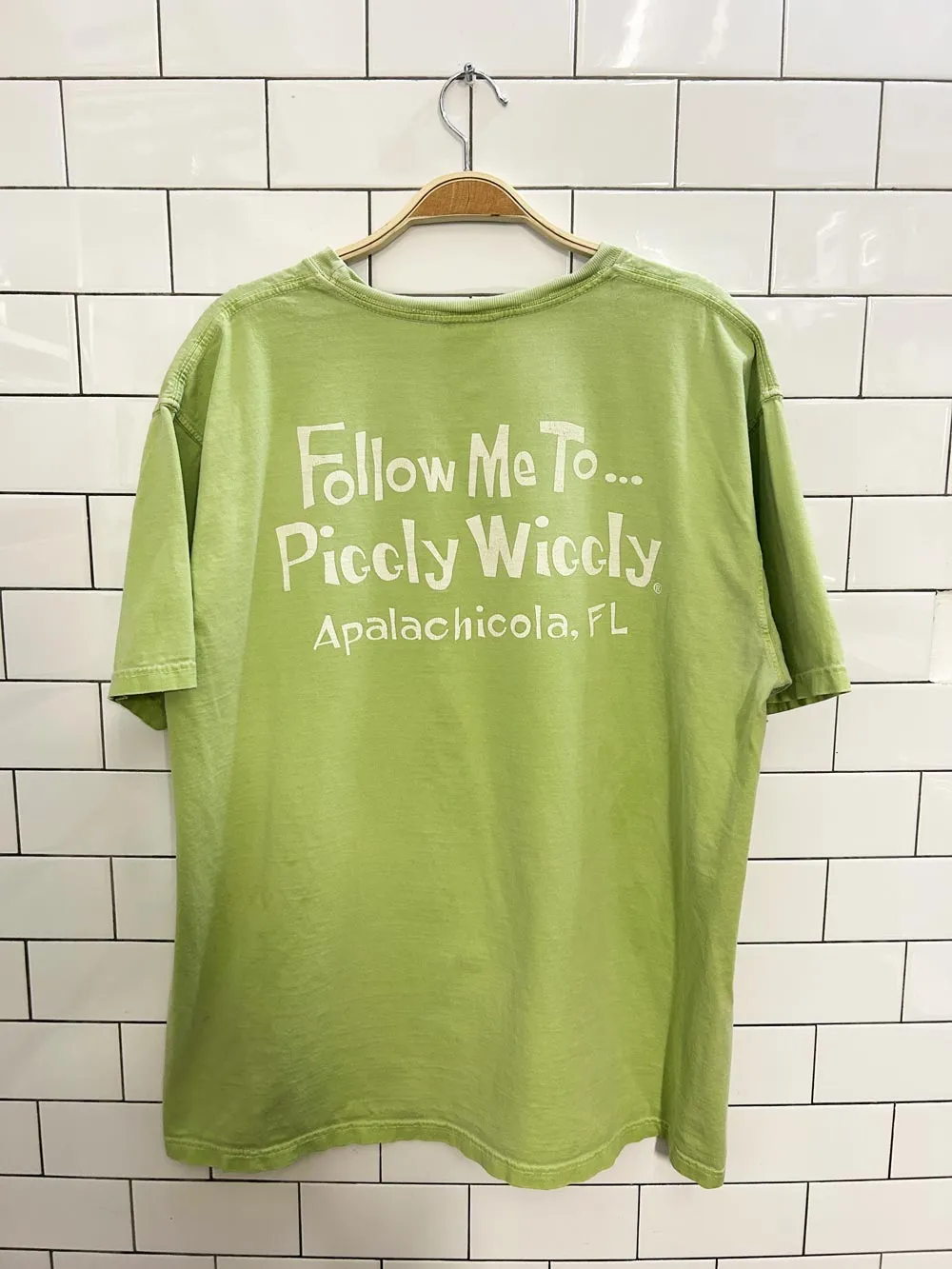 vintage 00s piggly wiggly supermarket graphic tee sold by Good Market Thrift Store product image thumbnail 3