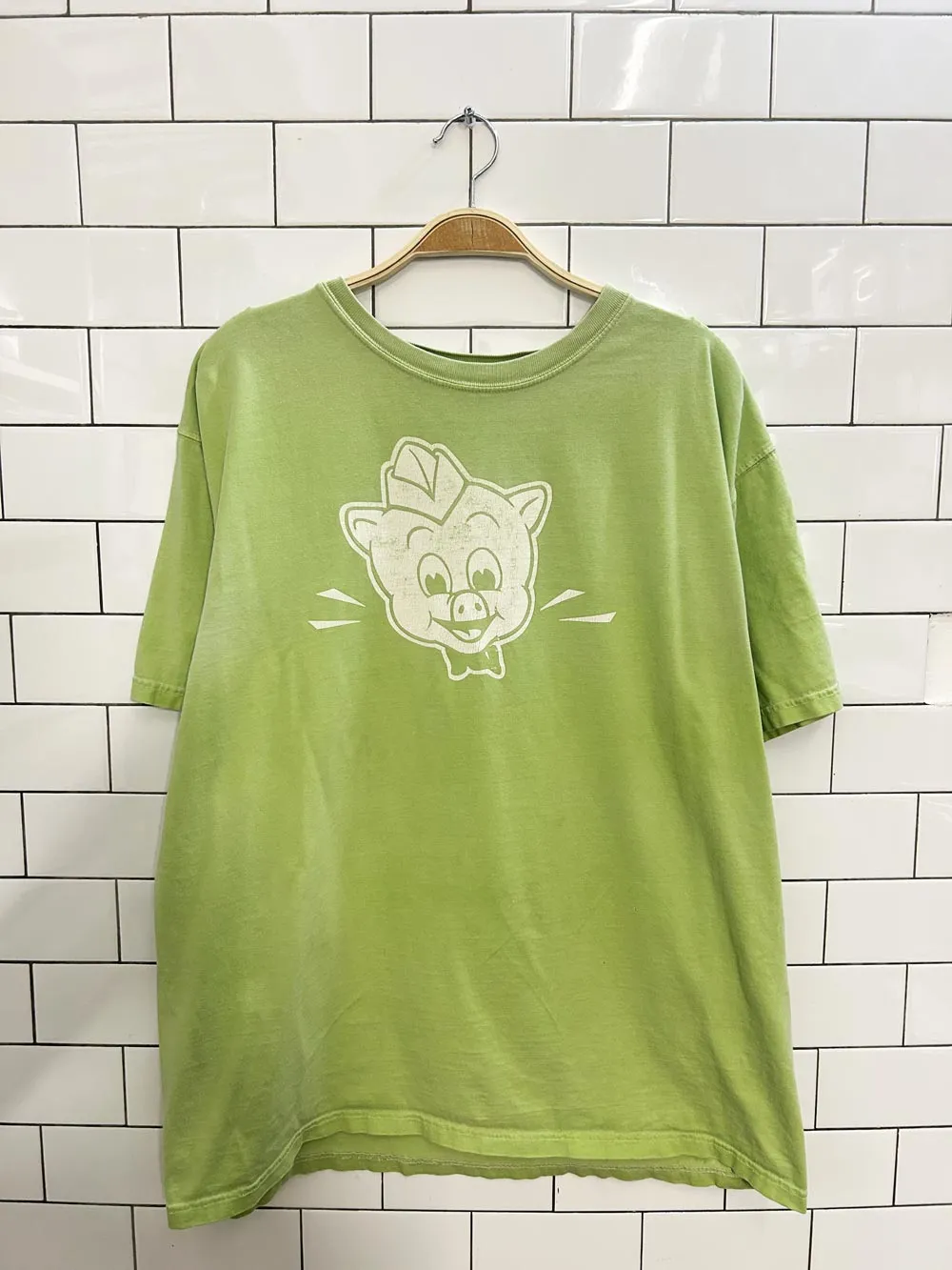 vintage 00s piggly wiggly supermarket graphic tee sold by Good Market Thrift Store