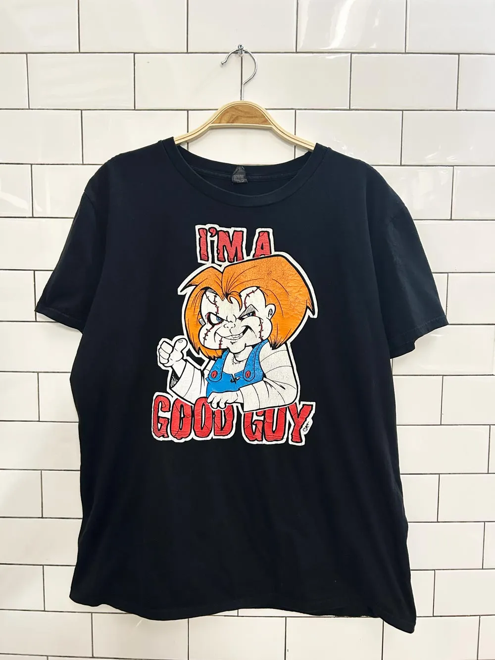 chucky horror movie graphic tee sold by Good Market Thrift Store