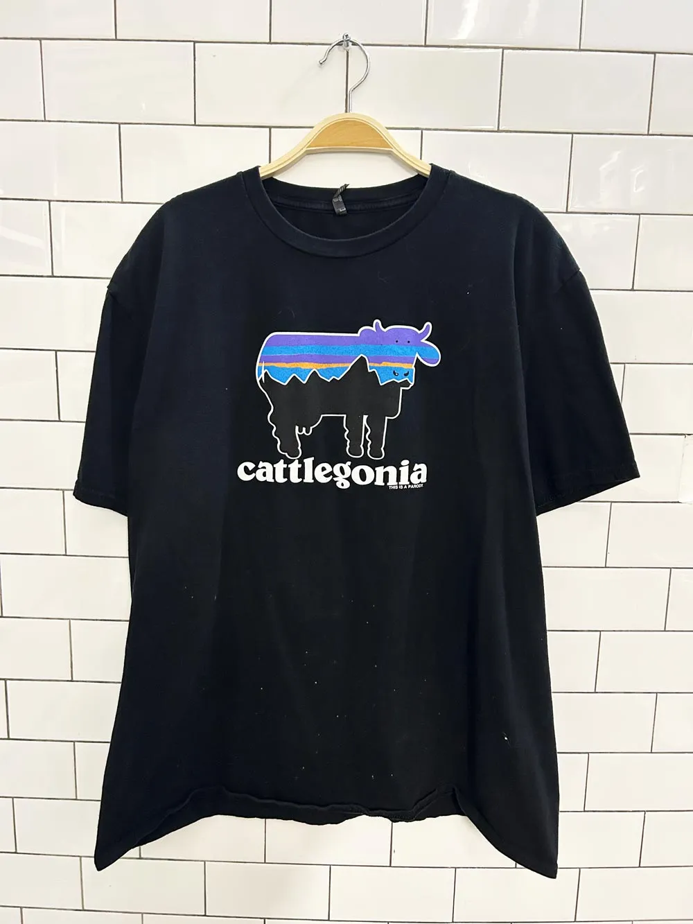 cows cattlegonia parody graphic tee sold by Good Market Thrift Store