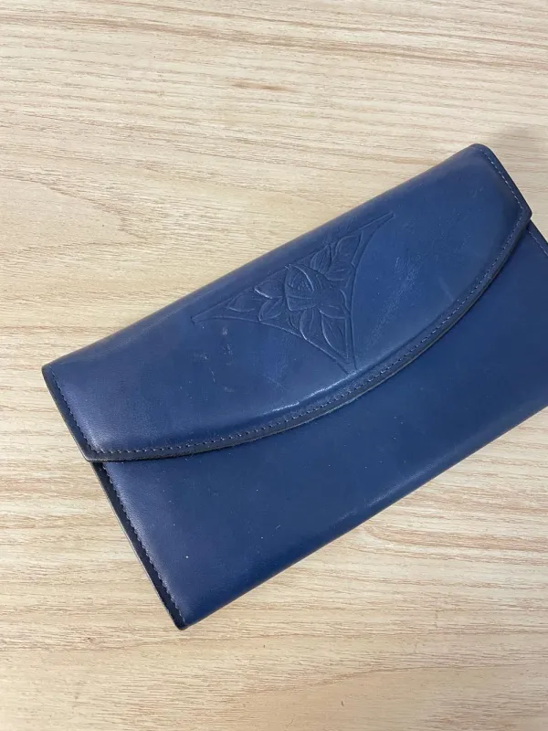 vintage rolfs tooled rose butter leather wallet sold by Good Market Thrift Store