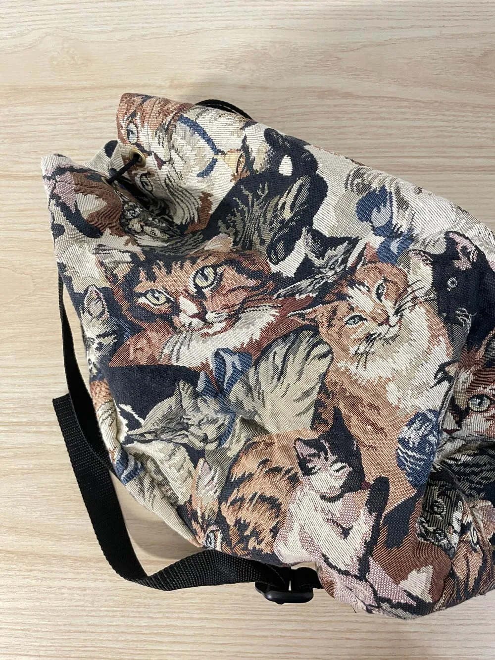 vintage cat tapestry sling backpack sold by Good Market Thrift Store