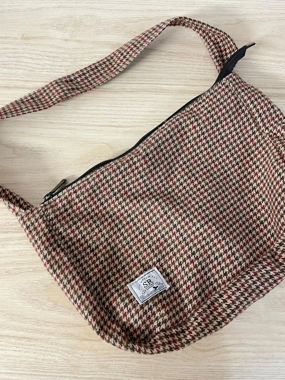 attitude woven houndstooth shoulder bag sold by Good Market Thrift Store