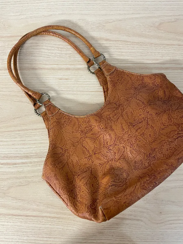 y2k nine west boho tooled leather shoulder bag sold by Good Market Thrift Store