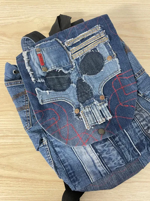 denim skull patchwork backpack sold by Good Market Thrift Store