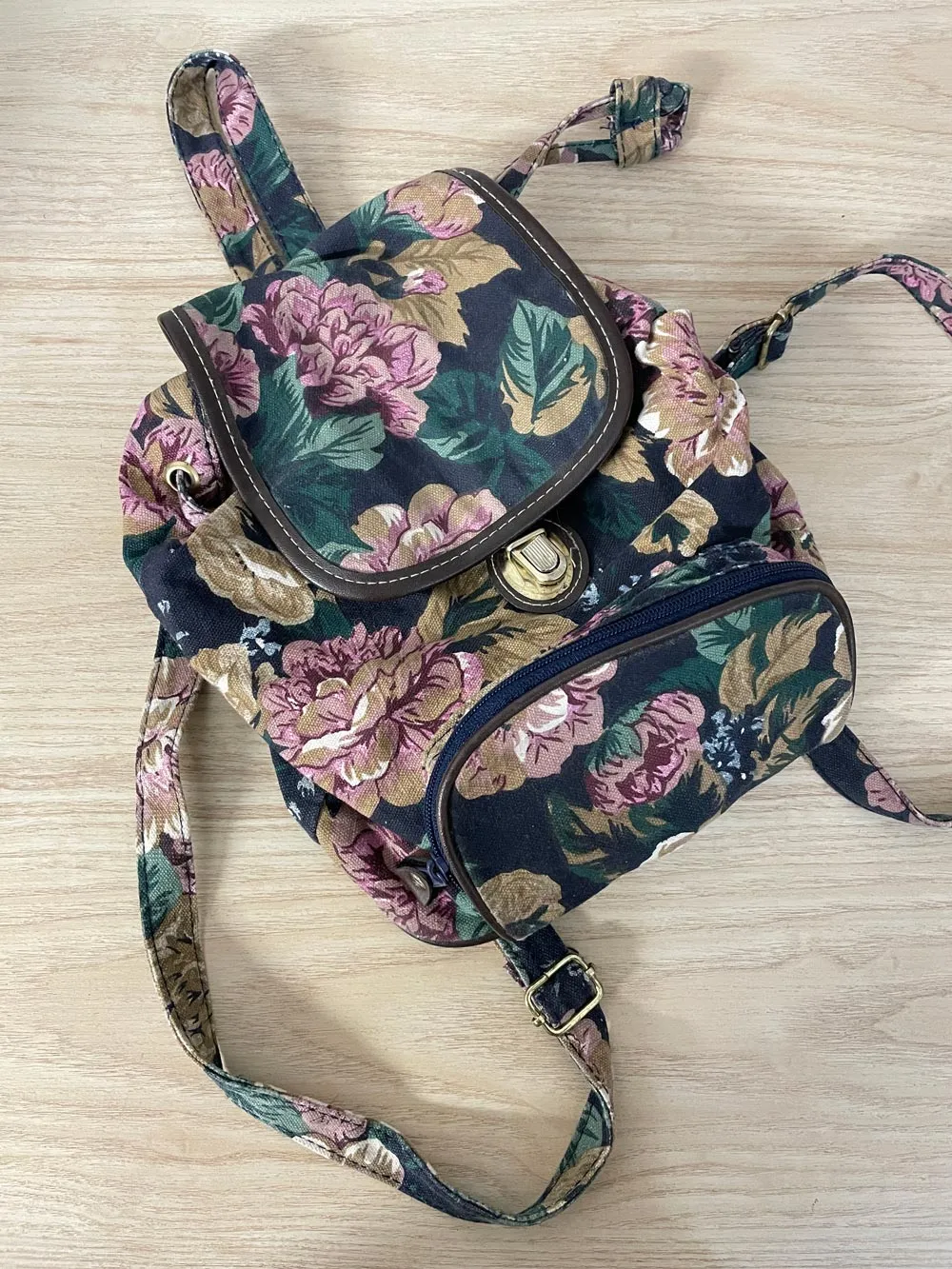 vintage 90s floral canvas mini backpack sold by Good Market Thrift Store