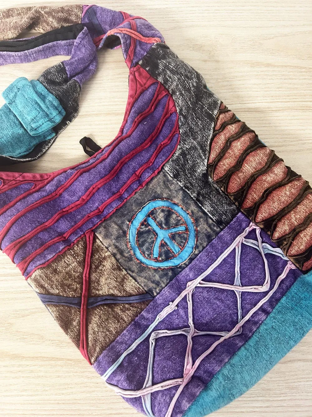 vintage ark boho patchwork peace sling bag sold by Good Market Thrift Store