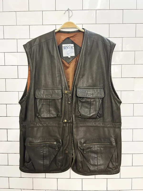 vintage 90s northern spirit wear leather utility vest sold by Good Market Thrift Store