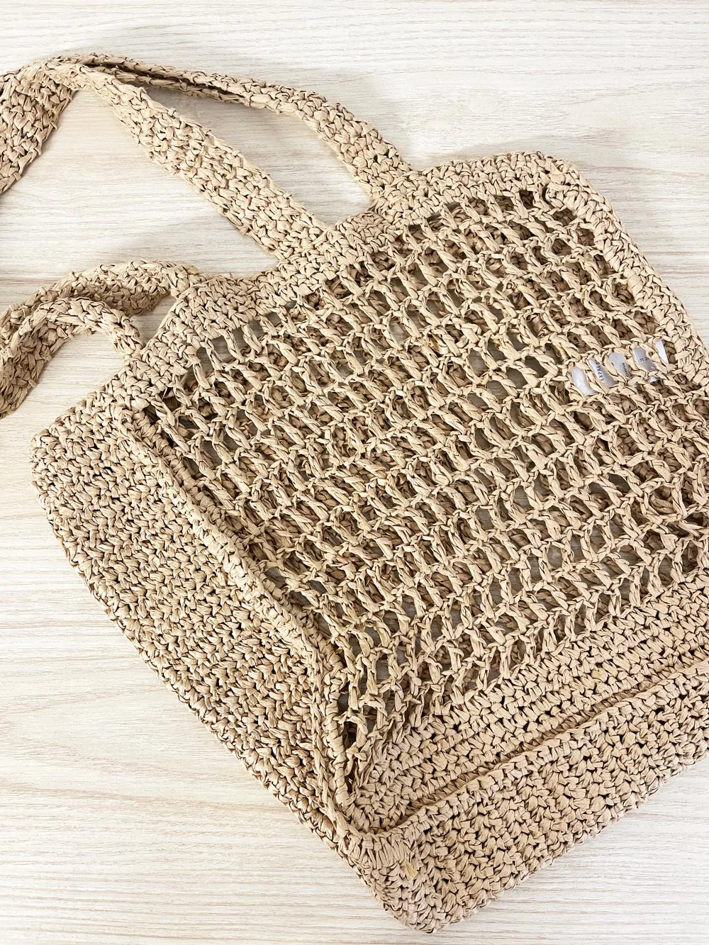 la express crochet raffia tote bag sold by Good Market Thrift Store