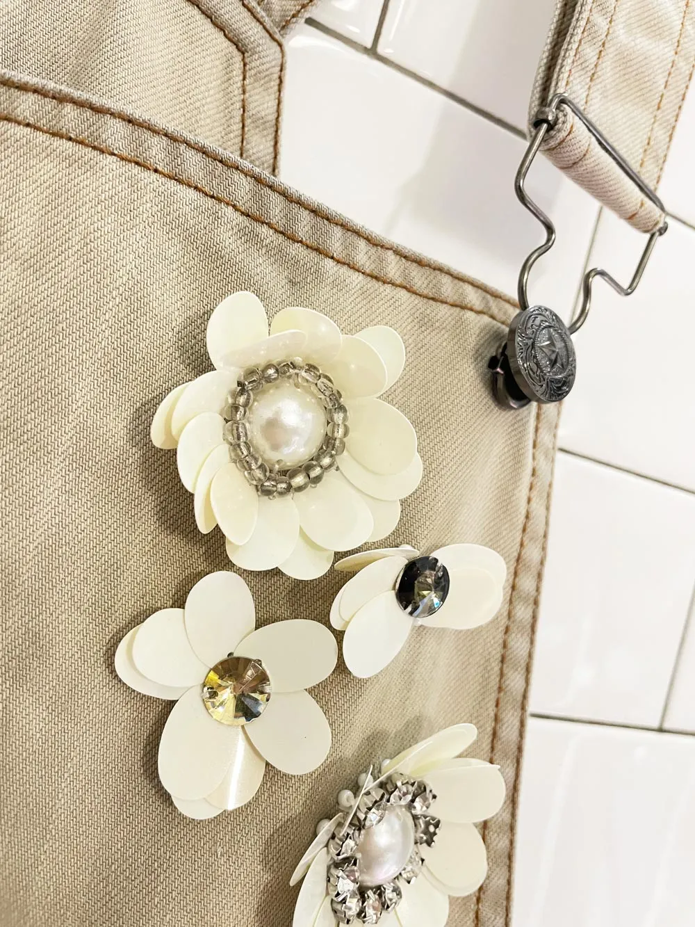 embellished flowers denim overall jumper sold by Good Market Thrift Store product image thumbnail 2