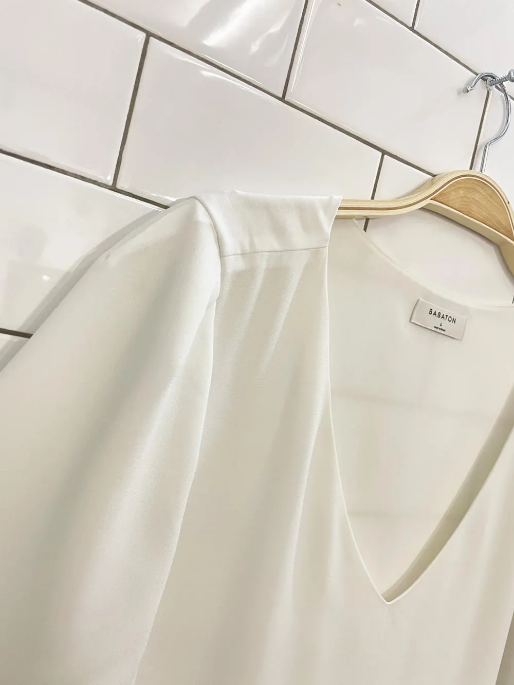 babaton randy short sleeve blouse sold by Good Market Thrift Store product image thumbnail 2