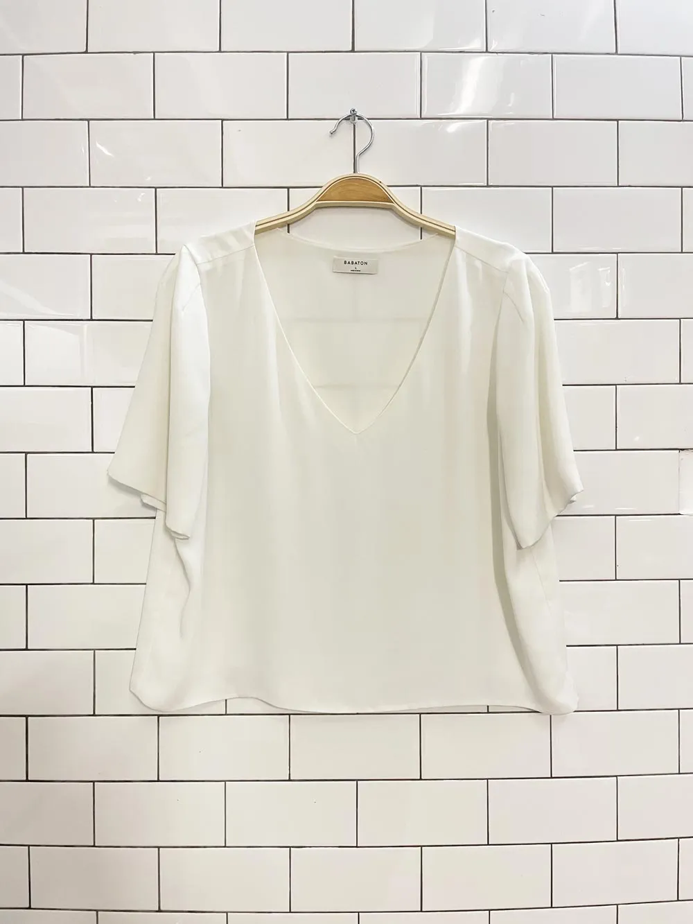 babaton randy short sleeve blouse sold by Good Market Thrift Store