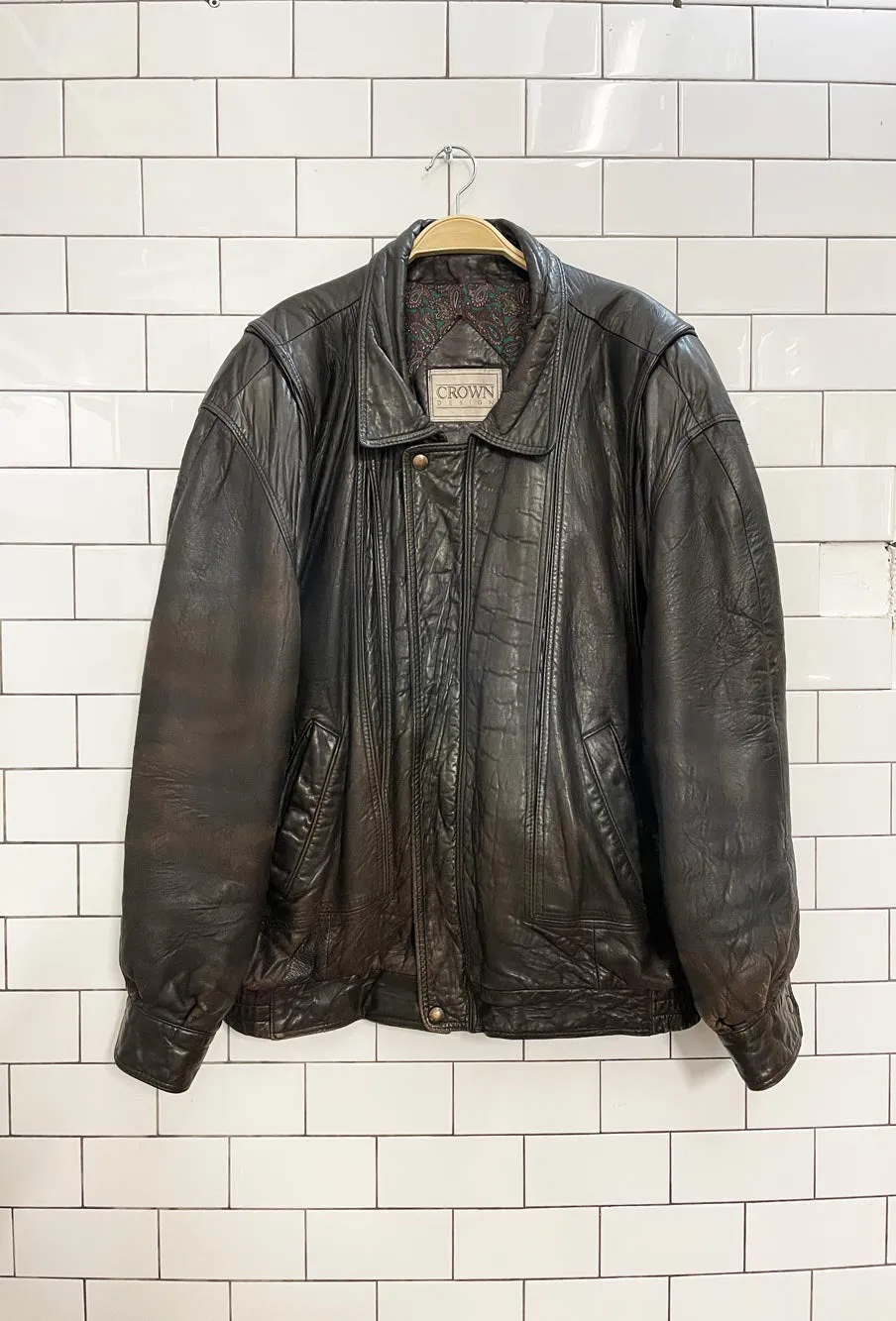 vintage 90s crown design soft leather bomber jacket sold by Good Market Thrift Store