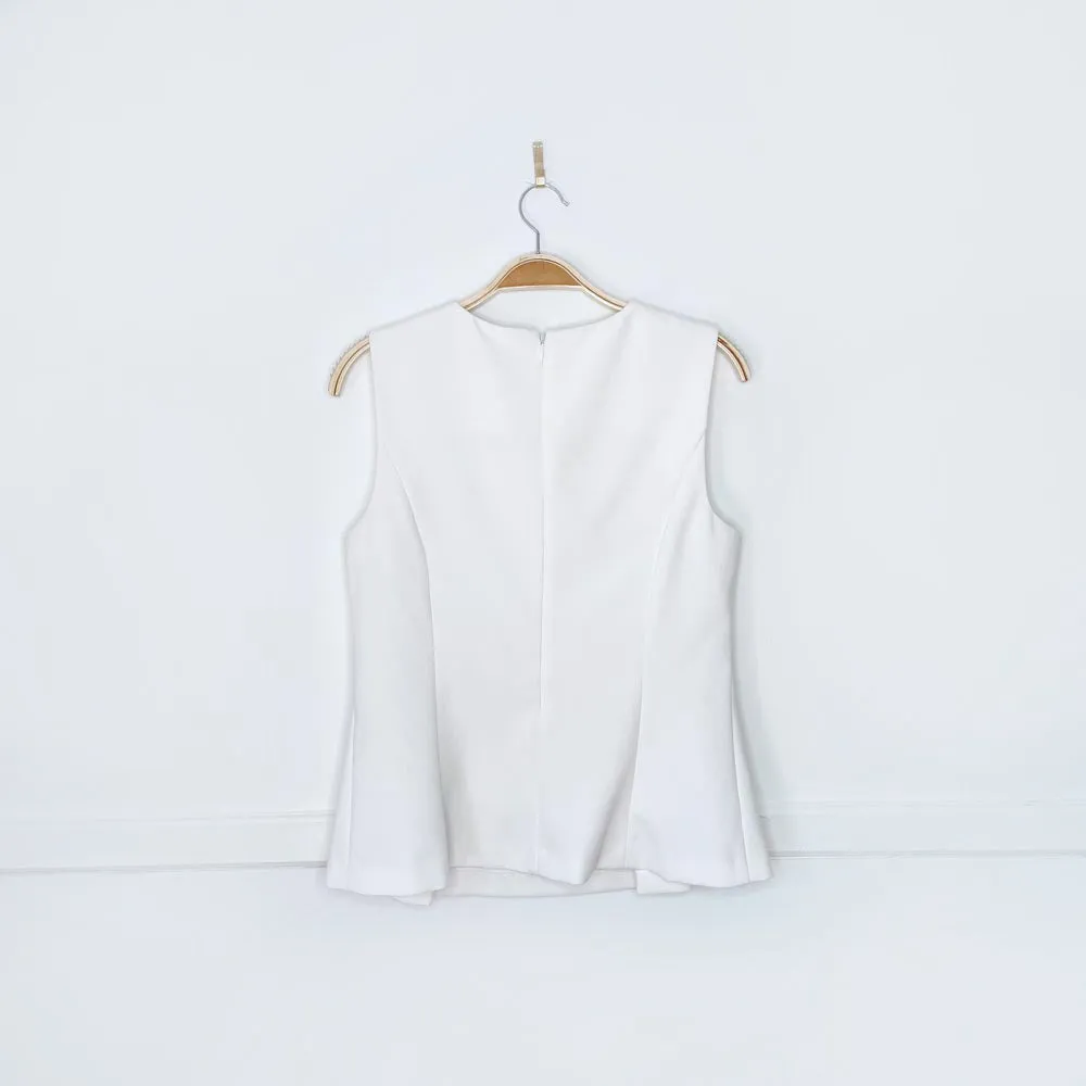 dvf sleeveless peplum hem top sold by Good Market Thrift Store product image thumbnail 2