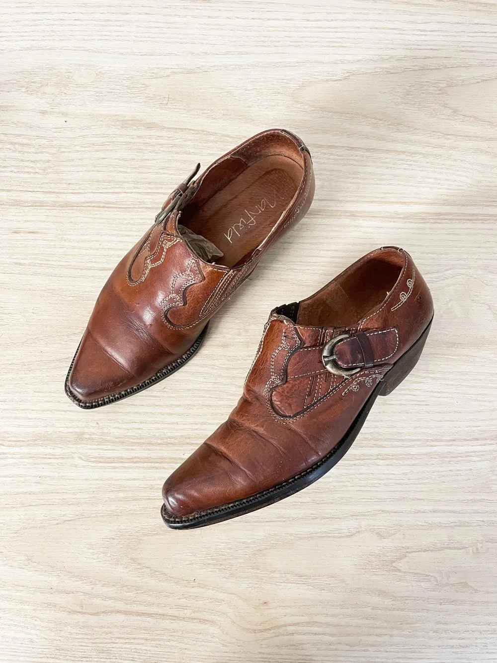 vintage 90s manfield western leather ankle boot sold by Good Market Thrift Store