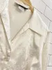 vintage 00s daniel laurent embroidered satin blouse sold by Good Market Thrift Store