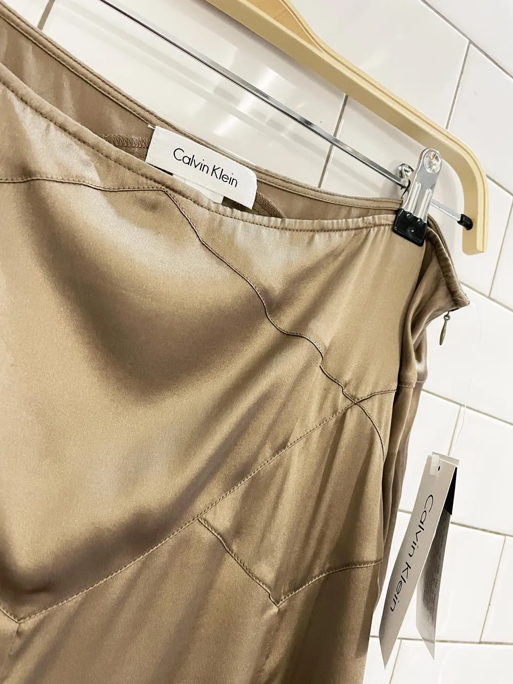 nwt calvin klein silk-blend tulip knee-length skirt sold by Good Market Thrift Store product image thumbnail 2