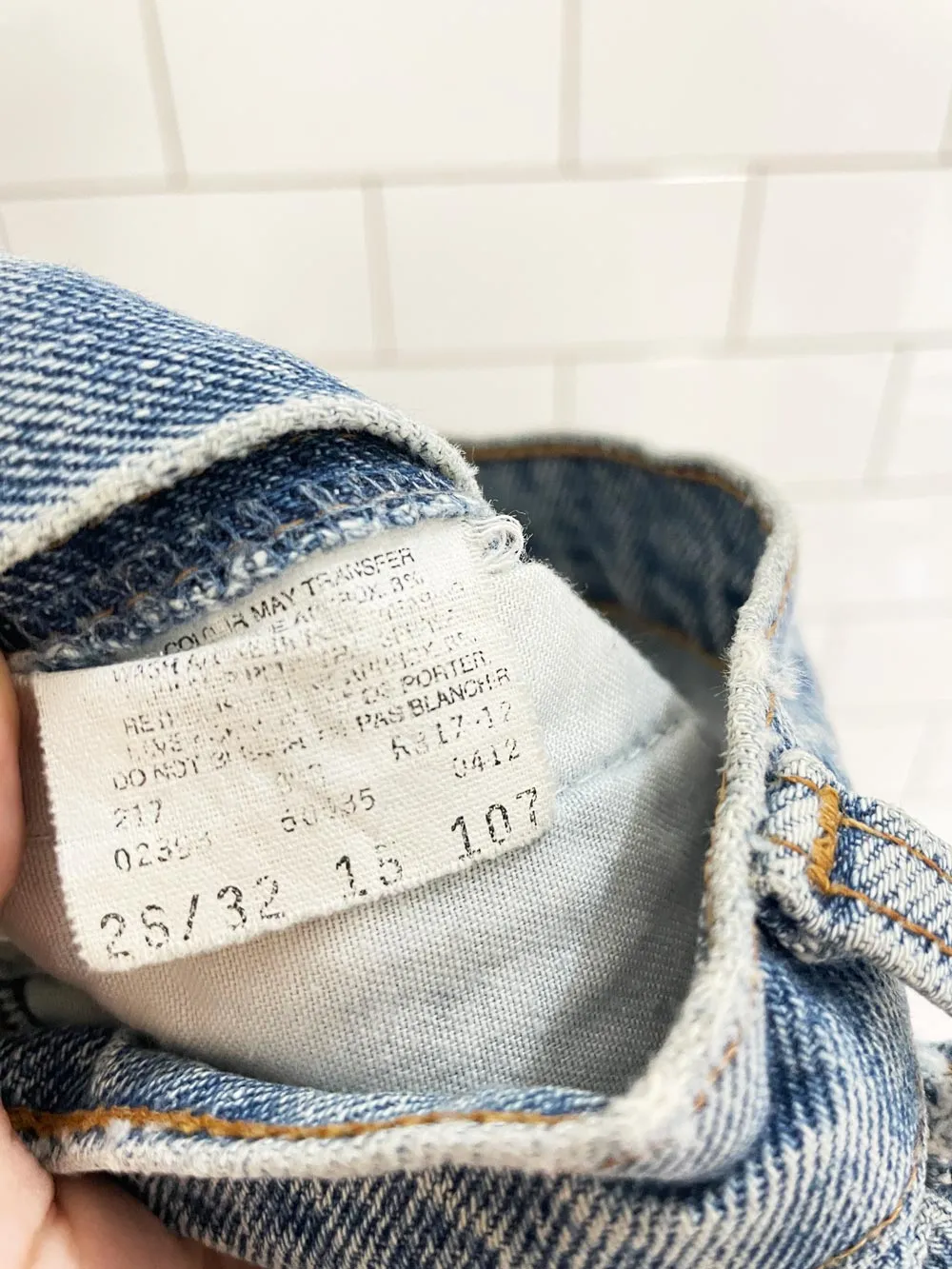 vintage 90s levis 585 baggy leg raw hem jeans sold by Good Market Thrift Store product image thumbnail 3