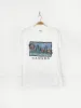 vintage 00s canada nature scene graphic tee sold by Good Market Thrift Store