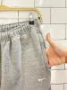 nike minimal swoosh grey joggers sold by Good Market Thrift Store
