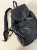 vintage 90s grunge leather patchwork backpack sold by Good Market Thrift Store