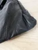 vintage 90s grunge leather patchwork backpack sold by Good Market Thrift Store